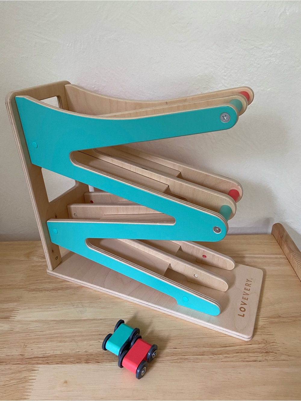 Lovevery race and chase car ramp with extra cars